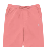 Jogging de sport pour femme en PET recyclé et modal, de couleur rose pâle, avec un élastique resserrant à la taille et aux chevilles. Ce jogging a une coupe décontractée. Photo du produit rapproché pour voir le logo et la taille.