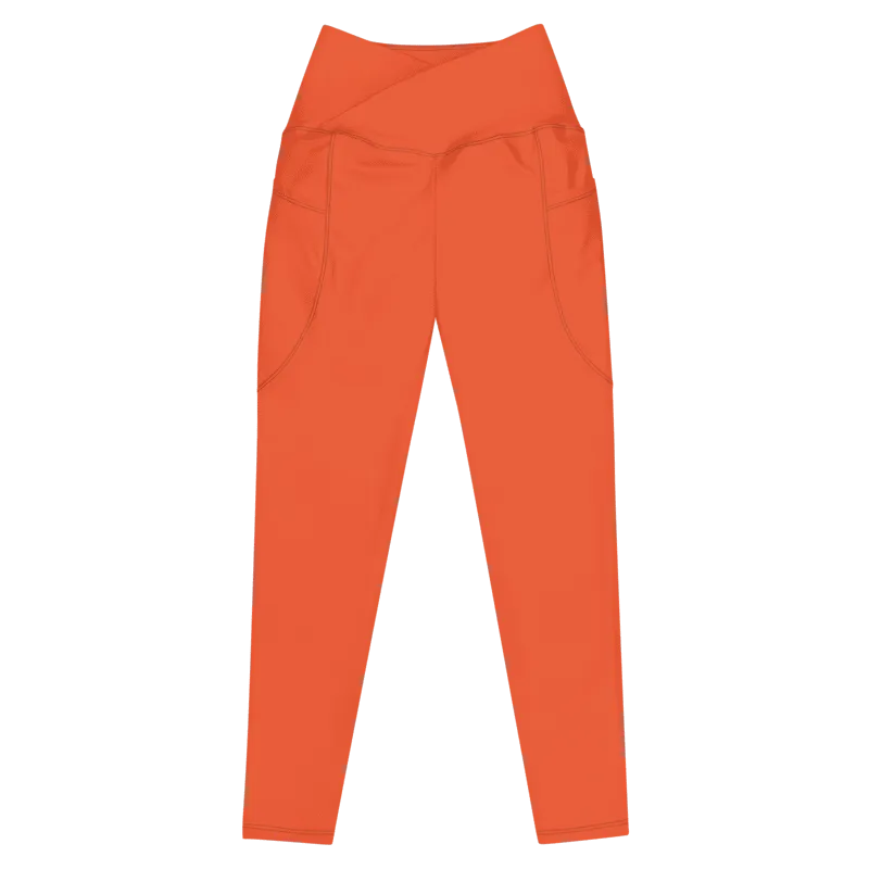 legging sport femme taille haute avec double poche de couleur orange. Coupe taille haute pour un effet sculptant et un maintien optimal. Photo du produit de devant.