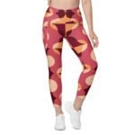 Legging de sport pour femme taille haute avec double poche à motif rétro avec des formes géométriques de couleur rose, bordeaux et orange. Coupe taille haute pour un effet sculptant et un maintien optimal. Photo du produit porté de devant.