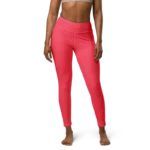 Legging de sport pour femme rouge en nylon Éconyl, tissu léger sans couture, effet seconde peau pour un confort optimal. Photo porté de face.