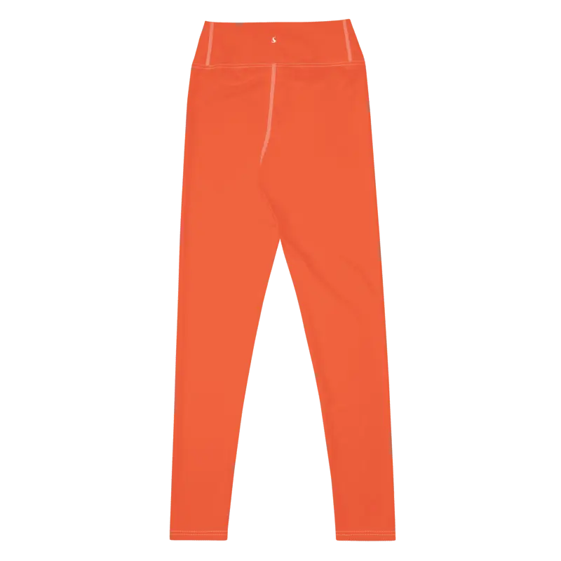 Legging de sport pour femme orange en nylon Éconyl, tissu léger sans couture, effet seconde peau pour un confort optimal. Photo du produit de derrière