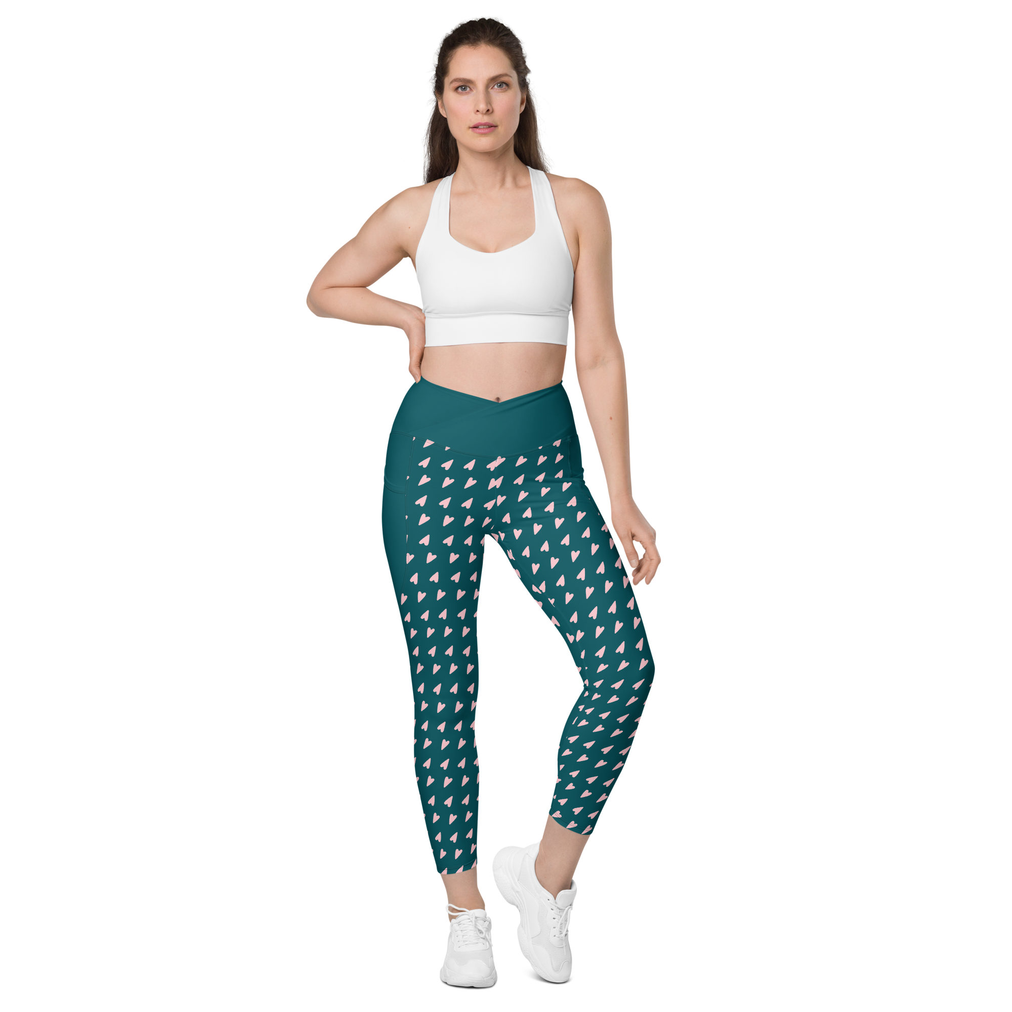 femme portant un legging vert à motifs roses de face