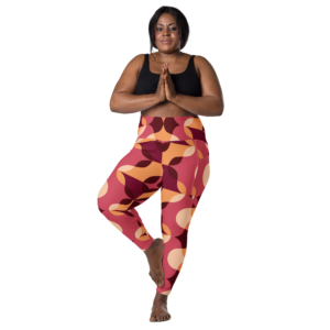 femme en position de l'arbre yoga en legging et brassière