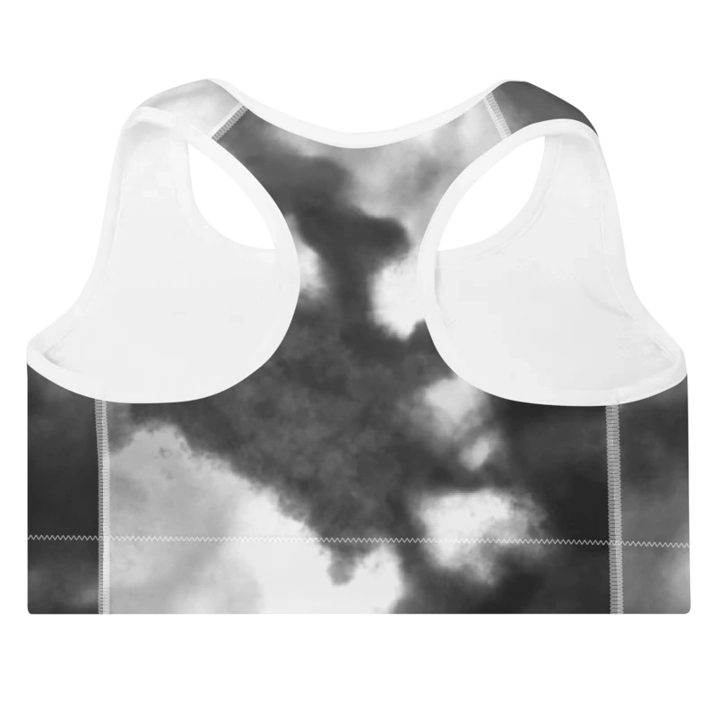 Brassière de sport Sweat Hold Up en nylon Econyl, douce et respirante, avec dos nageur pour un maintien léger. Disponible dans plusieurs motifs. Photo du produit de dos avec le motif Tie and dye noir et blanc.