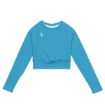 Crop top de sport Hot Focus à manches longues en coloris bleu, conçu pour allier confort et style lors des entraînements. photo de face du produit.