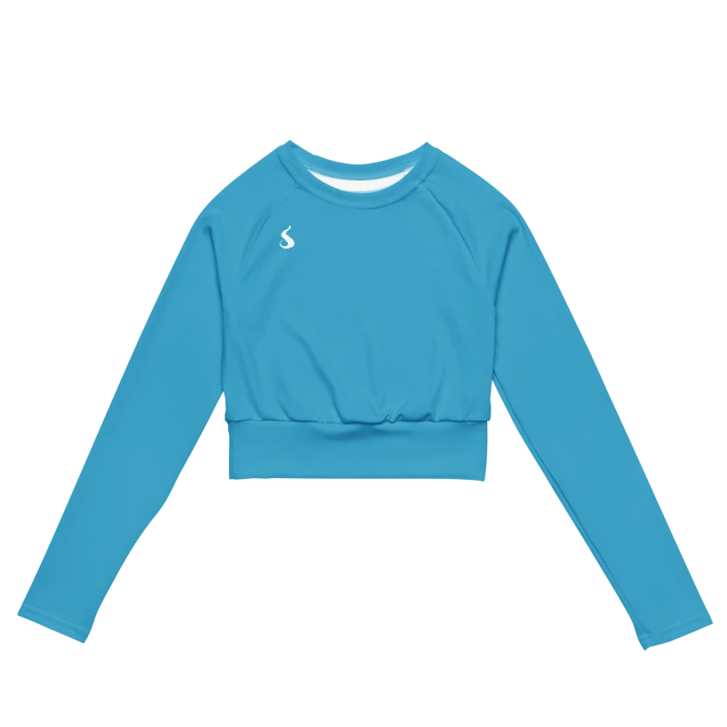 Crop top de sport Hot Focus à manches longues en coloris bleu, conçu pour allier confort et style lors des entraînements. photo de face du produit.