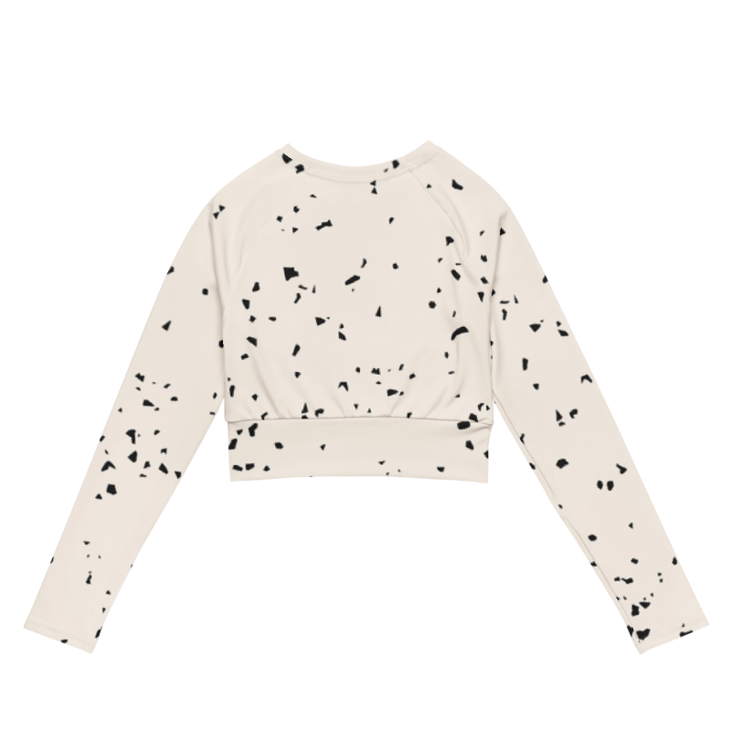Crop top de sport Hot Focus à manches longues, blanc cassé à pois noirs, conçu pour allier confort et style lors des entraînements. photo arrière du produit.