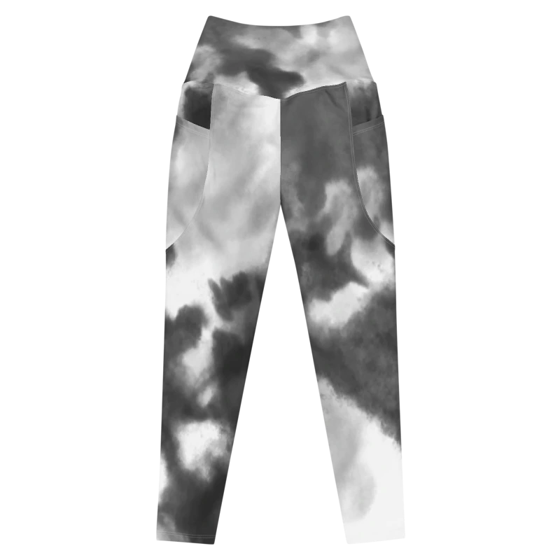 Legging de sport pour femme taille haute avec double poche à motif tie and dye "effet nuage" en noir, gris et blanc. Coupe taille haute pour un effet sculptant et un maintien optimal. Photo du produit de face.